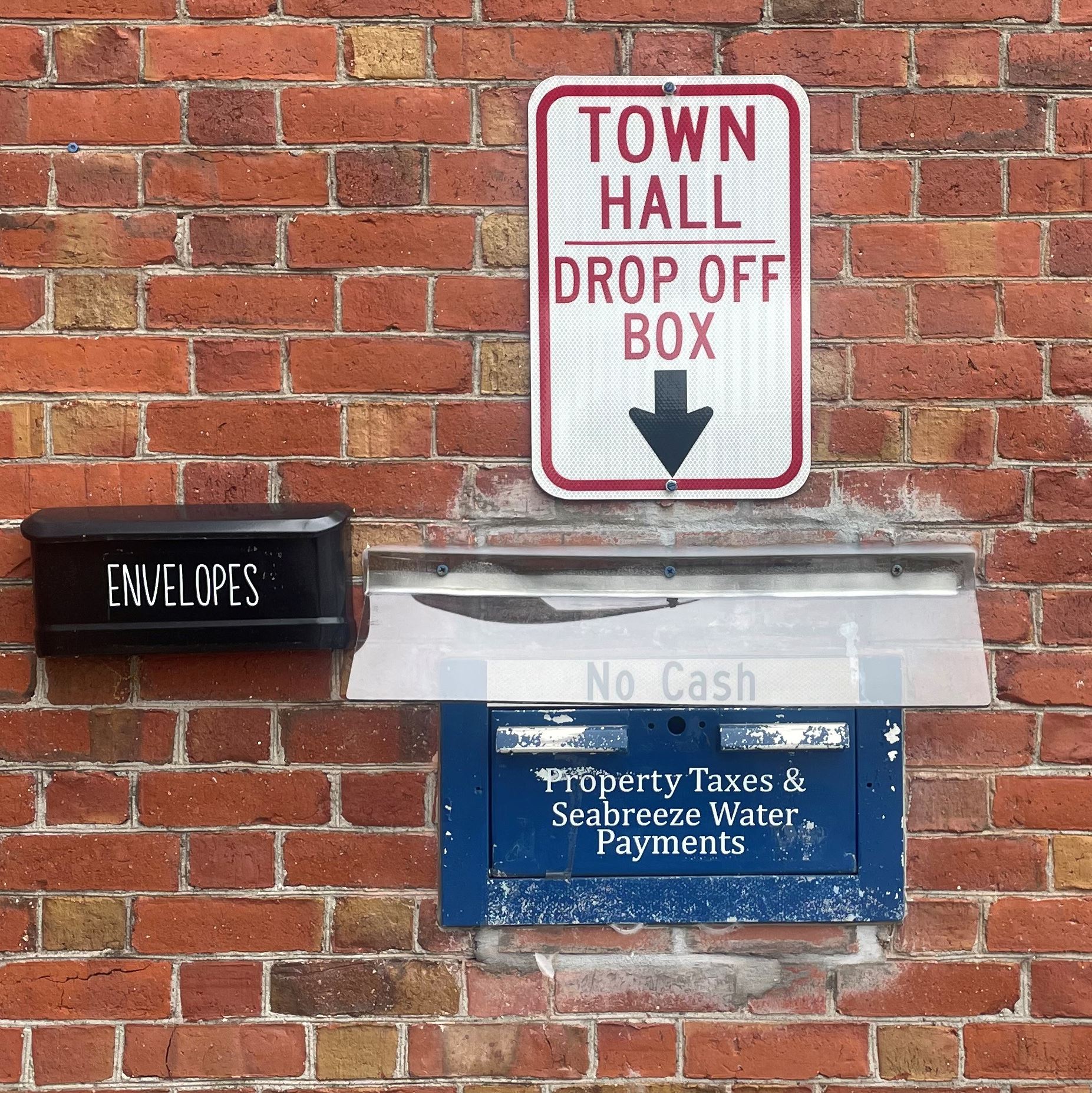 Image of the tax drop-off box on the exterior of town hall